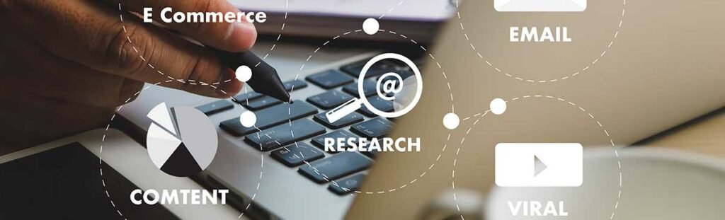FAQs About Hiring A Digital Marketing Agency 3 Photo digital marketing new startup project millennials business team hands at work with financial reports and a laptop
